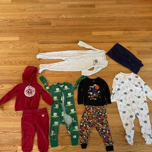 Lot of kids pajamas and clothes.  1 True Religion sweatsuit, 1 Hannah Andersson